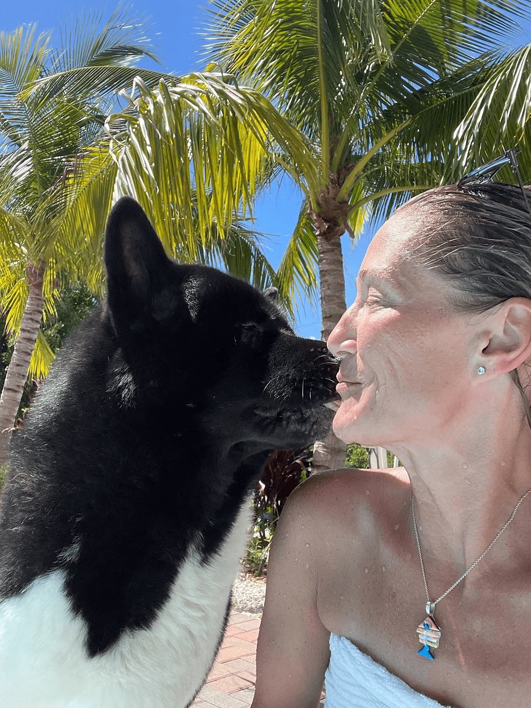 She loves her dog and enjoying the pool